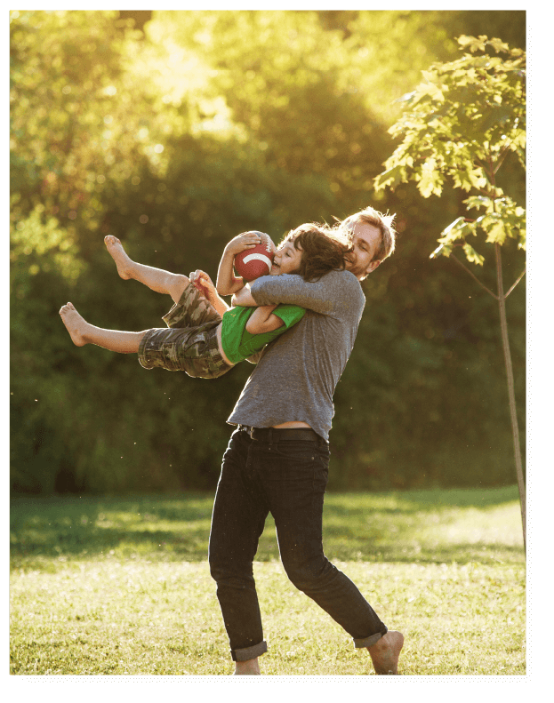 Dad and kid playing